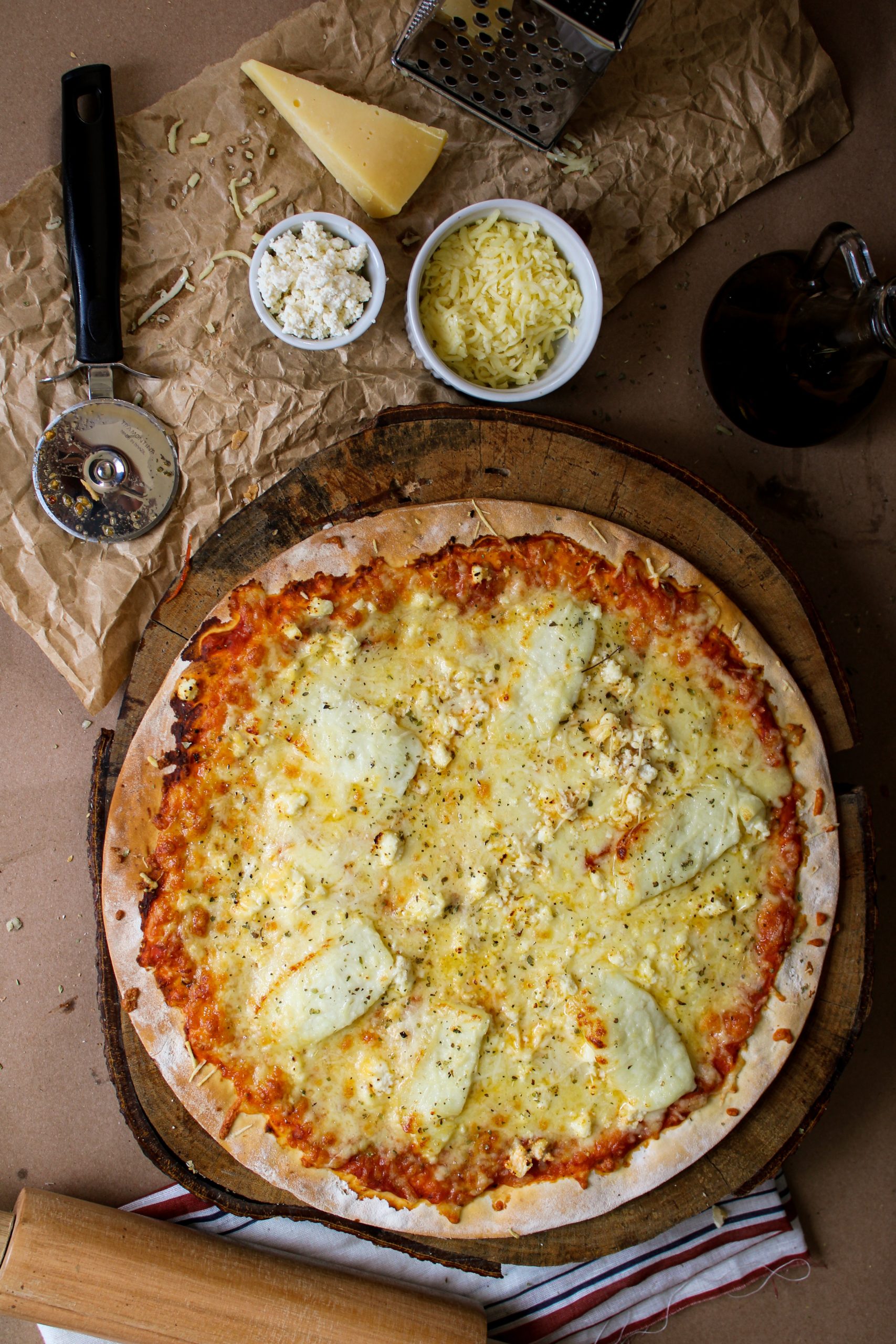 Making goat cheese calabrese pizza